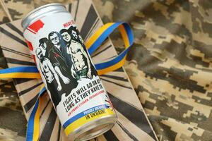 KYIV, UKRAINE - MAY 4, 2022 Localy brewed beer called Fights will go on as long as they have to photo
