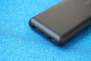 KYIV, UKRAINE - MAY 4, 2022 Portable Powerbank battery with logo of Belkin International photo