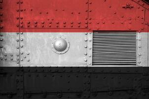 Yemen flag depicted on side part of military armored tank closeup. Army forces conceptual background photo