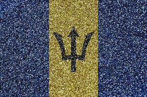 Barbados flag depicted on many small shiny sequins. Colorful festival background for party photo