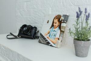 photo canvas on white brick wall collage in the interior