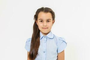 Portrait of a cute 7 years old girl. Isolated over white background. photo