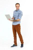 man working with laptop. Over white background photo