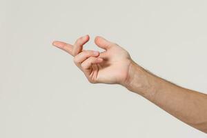 Man stretching hand to handshake isolated on a white background photo