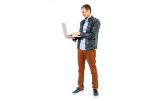 man working with laptop. Over white background photo