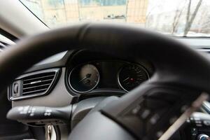 Modern car interior with dashboard and multimedia photo