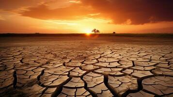 maravilloso puesta de sol terminado un seco fuera campo. el dorado Dom yesos un calentar resplandor terminado el agrietado tierra, creando un dramático y hermosa escena. generativo ai foto