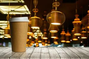 coffee in a paper cup in coffee shop photo