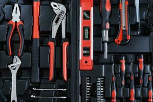 Toolbox with instruments for repair and maintenance, close up photo