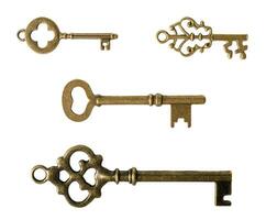 Antique bronze keys, isolated on white or transparent background. photo