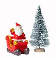 Christmas tree and Santa Claus isolated on white or transparent background. photo