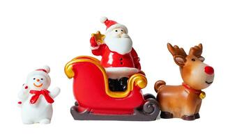 Christmas tree and Santa Claus in sleigh with reindeer isolated on white or transparent background. photo