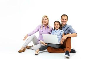 family with laptop over white background photo