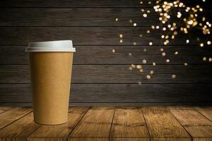 Takeaway coffee in a paper cup dark background photo