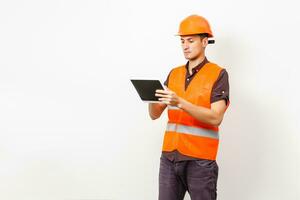 construction worker using digital tablet photo