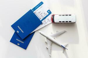 Passport and plane with holiday travel ideas photo