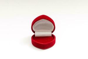 Red velvet box for the ring, opened, isolated over the white background photo