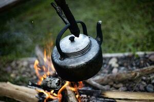 Coffee Pot On Campfire photo