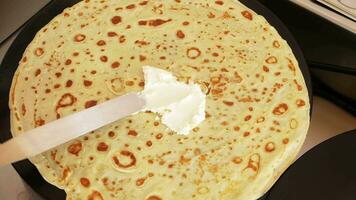 process of cooking pancakes, Russian holiday Pancake week. Restaurant, cafe, takeaway. cottage cheese video