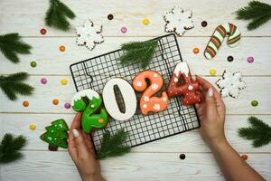 The numbers 2024 from gingerbread. New Year's background. Christmas dessert. photo