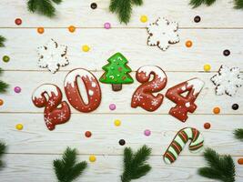 The numbers 2024 from gingerbread. New Year's background. Christmas dessert. photo