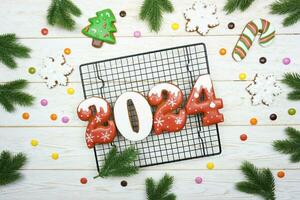 The numbers 2024 from gingerbread. New Year's background. Christmas dessert. photo