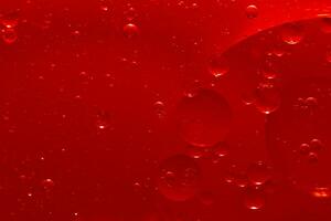 Water bubble texture on red background photo