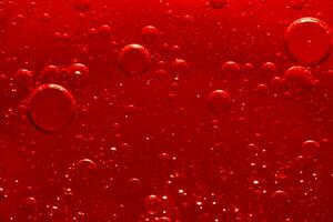 Water bubble texture on red background photo