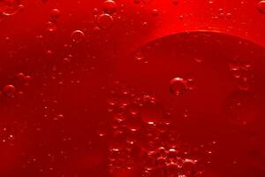 Water bubble texture on red background photo