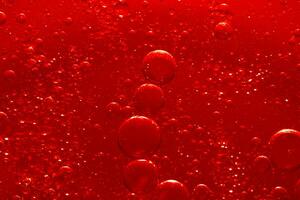 Water bubble texture on red background photo