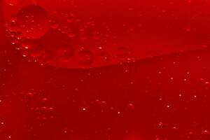 Water bubble texture on red background photo