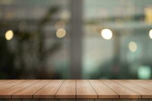 Empty wooden table top with lights bokeh on blur restaurant background. photo
