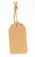 Blank brown rectangular brown paper tag on a rope  on white background, template for price, discount photo