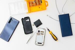 Flat Lay Top view of smartphone components isolate on white background with clipping path photo