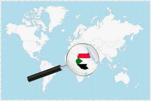 Magnifying glass showing a map of Sudan on a world map. vector