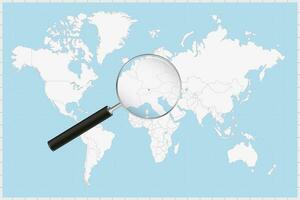 Magnifying glass showing a map of Liechtenstein on a world map. vector