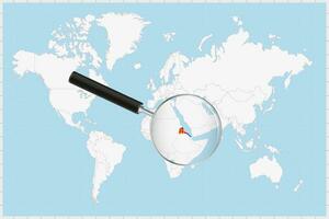 Magnifying glass showing a map of Eritrea on a world map. vector