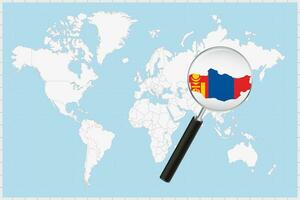 Magnifying glass showing a map of Mongolia on a world map. vector