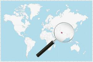 Magnifying glass showing a map of Nepal on a world map. vector