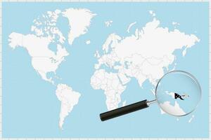 Magnifying glass showing a map of Papua New Guinea on a world map. vector