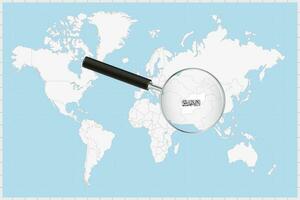 aumentador vaso demostración un mapa de Afganistán en un mundo mapa. vector