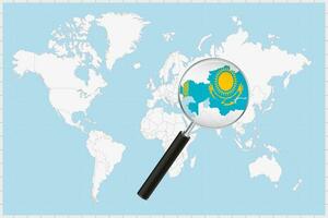 Magnifying glass showing a map of Kazakhstan on a world map. vector