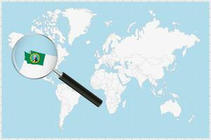 Magnifying glass showing a map of Washington on a world map. vector