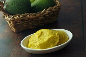 avocado and avocado pasted in a container photo