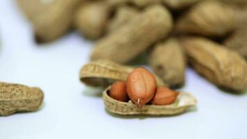 Peanuts, crunchy delights packed with flavor. A popular snack, rich in nutrients, enjoyed roasted or as a tasty ingredient in various dishes. photo