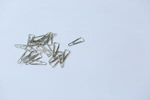 Trigonal clip, a triangular fastener, perfect for securing papers with style and efficiency in office or creative settings. photo