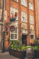 Gdansk, Poland - August 16, 2018 - Ancient building modernised to a restaurant photo