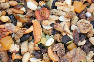 close up of many mixed nuts photo