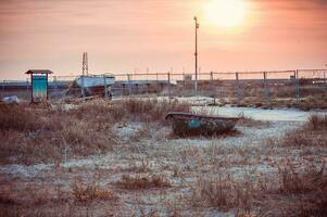 Abandoned small boats in the restricted area photo