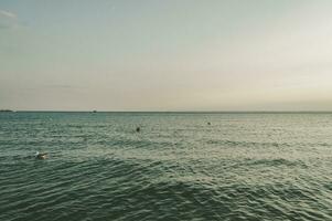 Calm water of Baltic sea in the evening photo